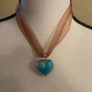 Double sided blue glass heart pendant on Brown Ribbon Choker